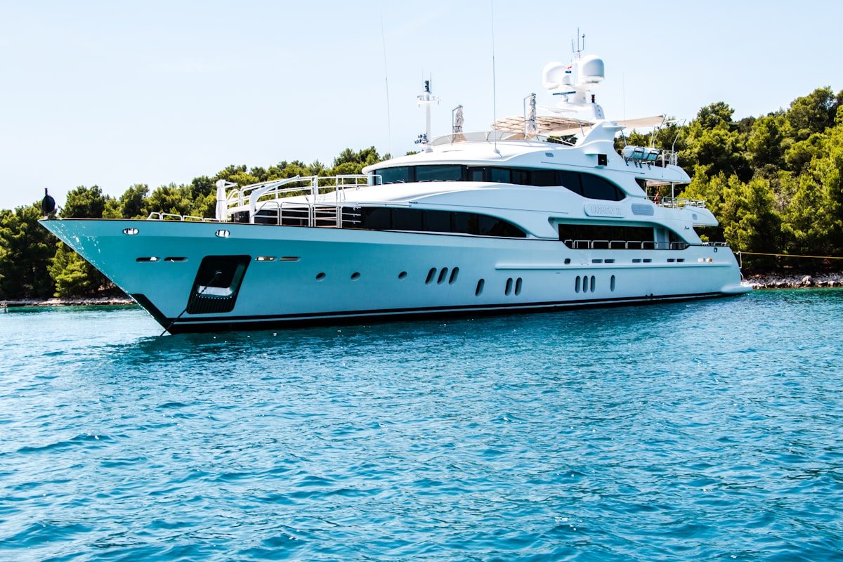 Private yacht anchored off the Bosphorus shoreline at sunset